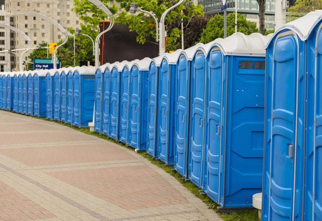 a row of sleek and modern portable restrooms at a special outdoor event in Mckinney